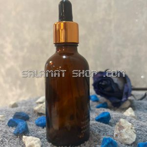 قطره چکان طلایی با شیشه دارویی